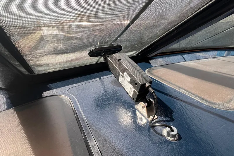 Slide: The Image of 2008 Tiara Yachts 3500 Sovran interior detail with electronic equipment and sunlit surfaces. - 56