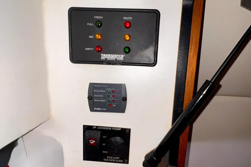 Slide: The Image of Control panel on 2008 Tiara Yachts 3500 Sovran, featuring TankWatch and ProMariner systems. - 57