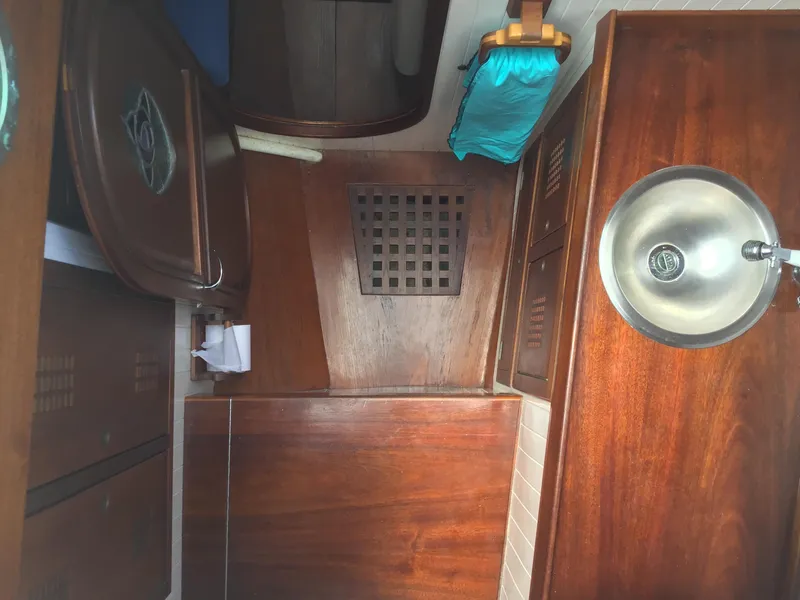 Slide: The Image of Interior of a 2006 Bristol Channel Cutter 28 with wooden finish. - 11