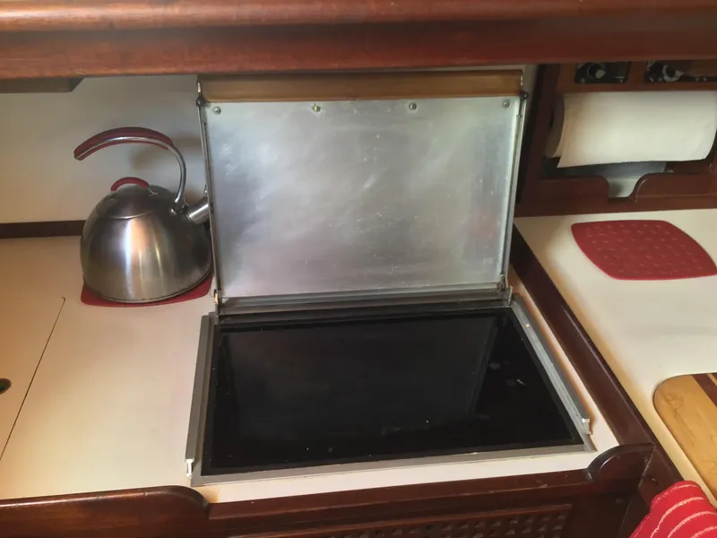 Slide: The Image of Interior of a 2006 Bristol Channel Cutter 28 with kettle and stove. - 23