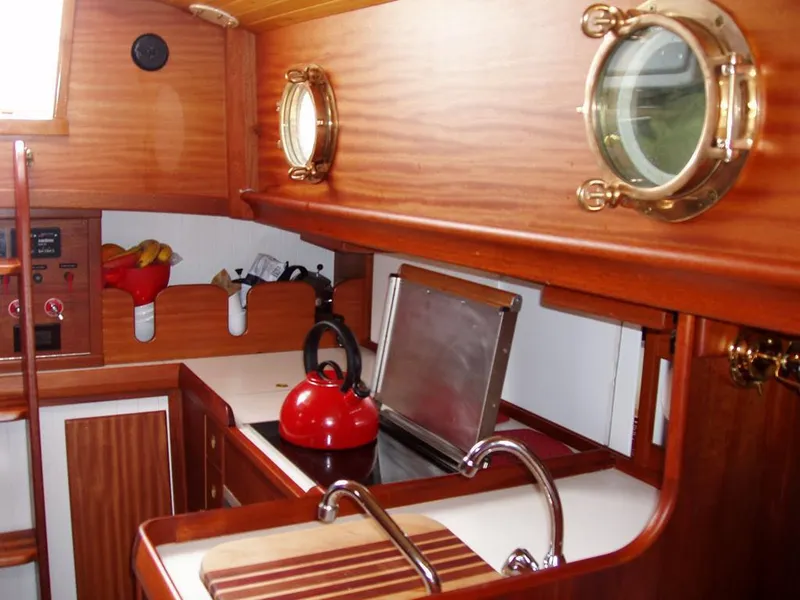 Slide: The Image of Interior of a 2006 Bristol Channel Cutter 28 with wooden finish. - 26