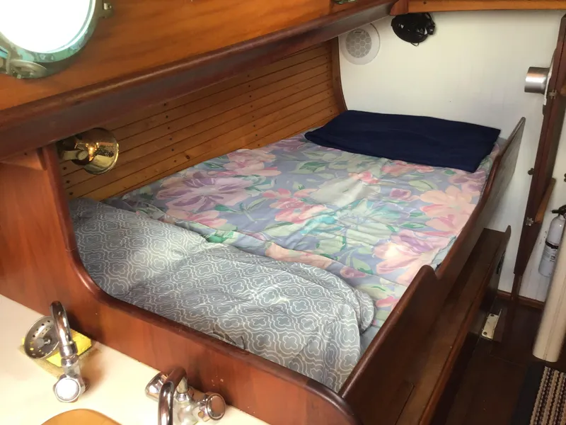 Slide: The Image of Interior of a 2006 Bristol Channel Cutter 28 with cozy bed. - 33