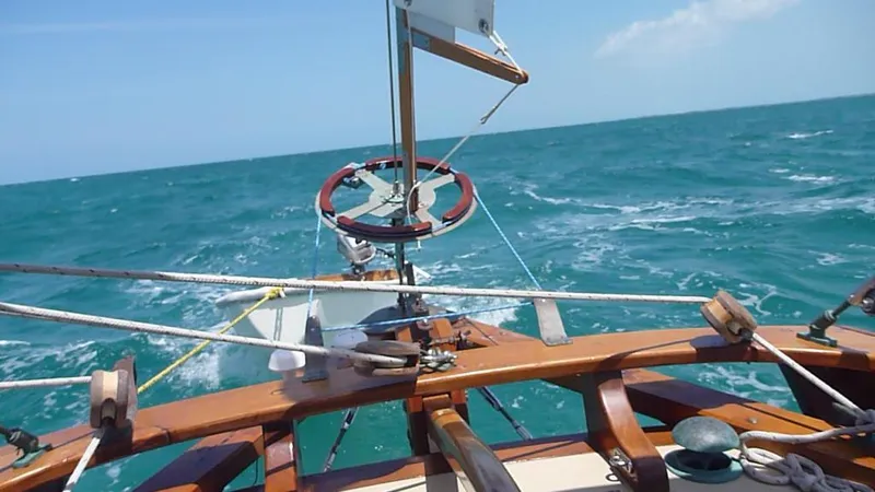 Slide: The Image of Bristol Channel Cutter 28 from 2006 sailing on open sea. - 5