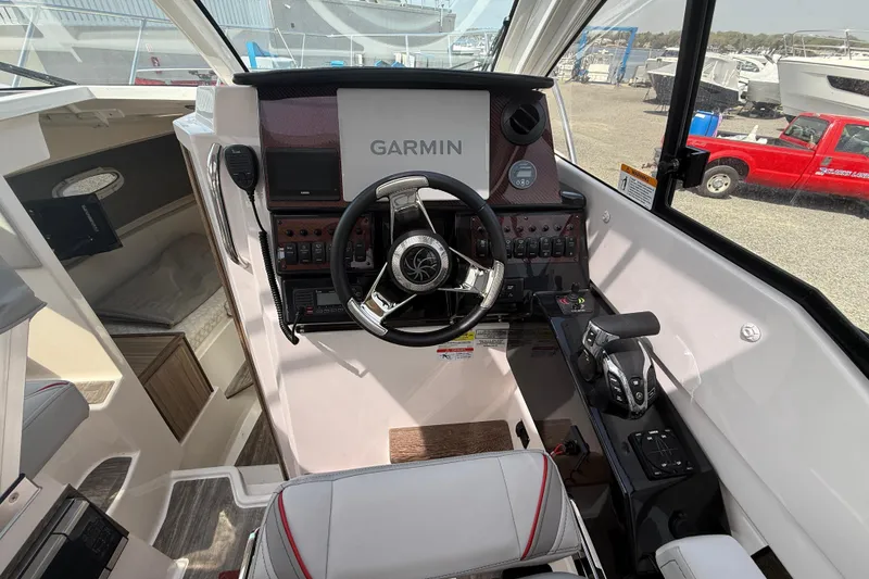 Slide: The Image of Cockpit of 2024 Solara S-250 Coupe with Garmin navigation system and modern controls. - 13