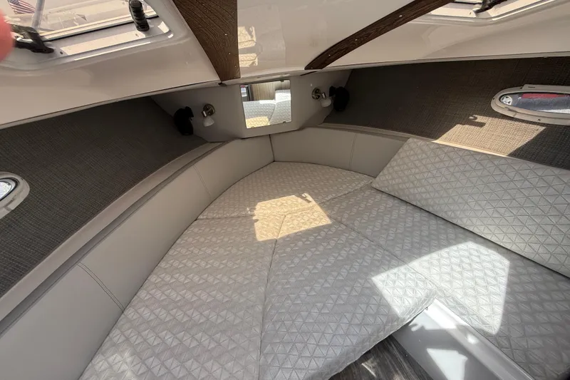 Slide: The Image of 2024 Solara S-250 Coupe interior cabin with cushioned seating and modern design. - 14