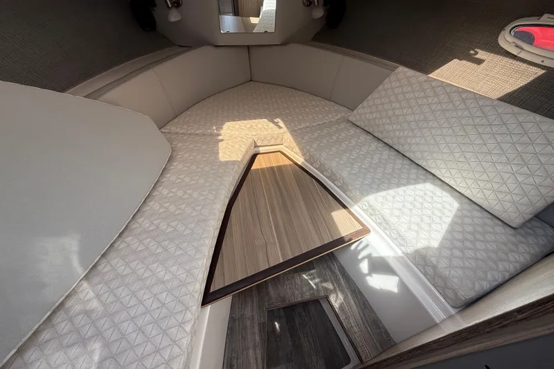 Slide: The Image of Interior of 2024 Solara S-250 Coupe, featuring elegant seating and wood accents. - 15