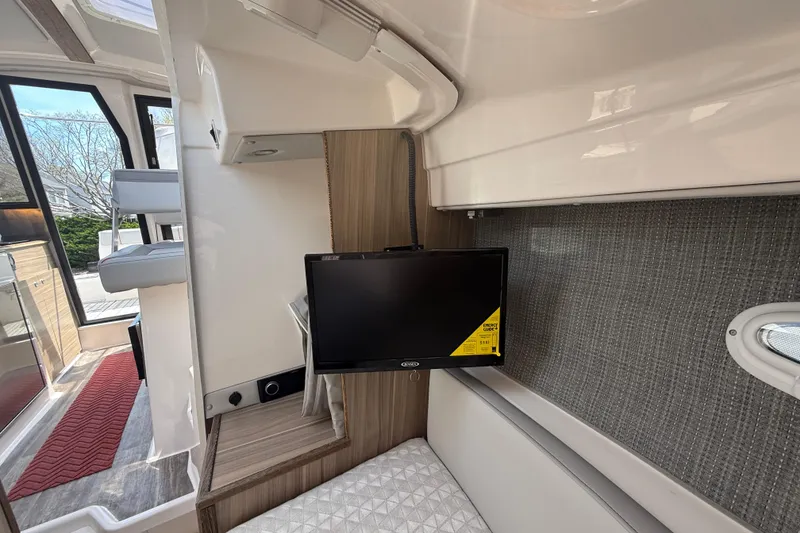 Slide: The Image of Interior of 2024 Solara S-250 Coupe with TV and seating area. - 17