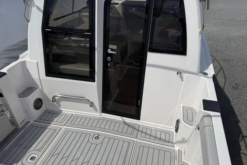 Slide: The Image of 2024 Solara S-250 Coupe boat deck with sleek design and modern features. - 7