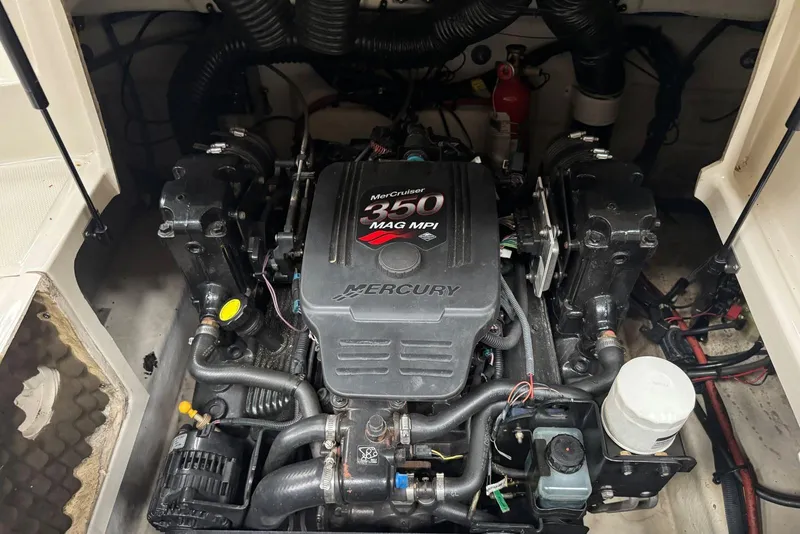 Slide: The Image of Engine compartment of a 2007 Sea Ray 240 Sundeck with MerCruiser 350 MAG MPI. - 22