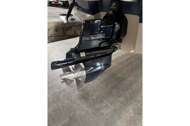 Slide: The Image of Close-up of a 2007 Sea Ray 240 Sundeck boat's MerCruiser propeller. - 5