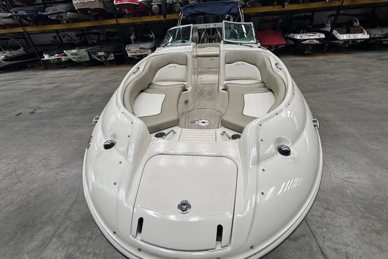 Slide: The Image of 2007 Sea Ray 240 Sundeck boat with spacious seating in storage facility. - 8