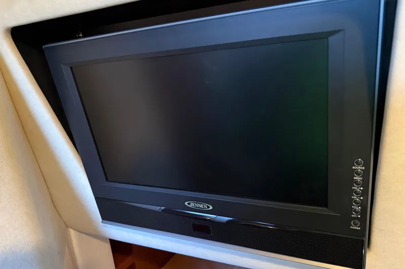 Slide: The Image of Flat-screen TV inside 2010 Sea Ray Sundancer 280 boat cabin. - 17
