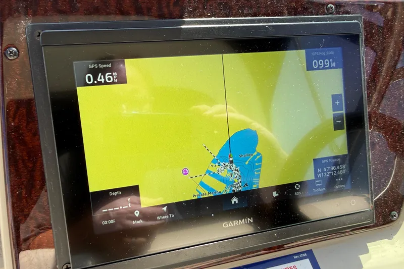 Slide: The Image of Garmin GPS display on 2010 Sea Ray Sundancer 280, showing speed and navigation details. - 27