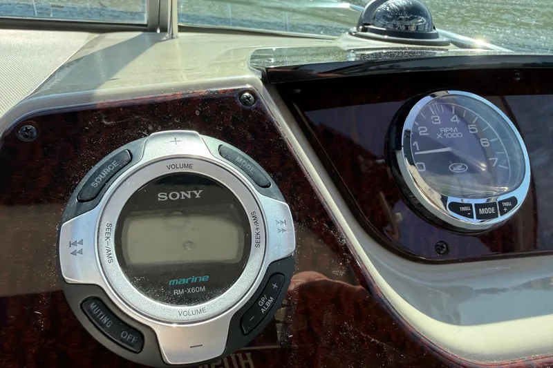 Slide: The Image of Control panel of a 2010 Sea Ray Sundancer 280 with Sony marine audio system. - 30