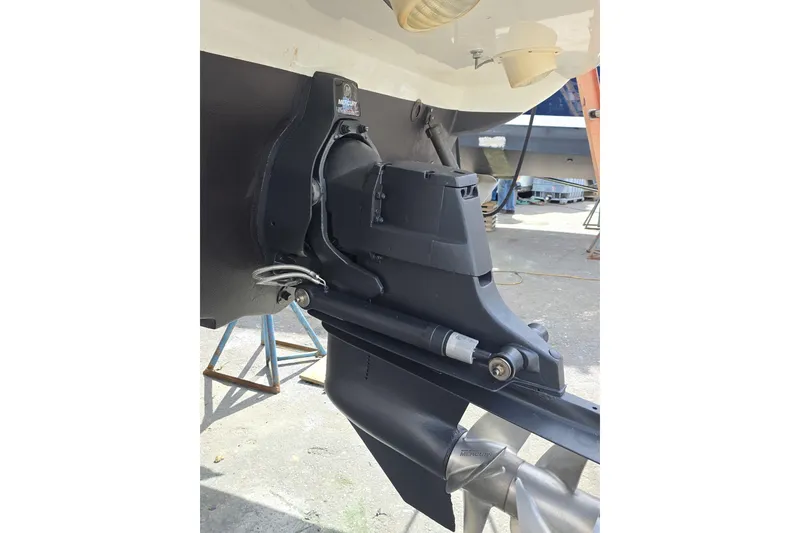 Slide: The Image of 2010 Sea Ray Sundancer 280 boat engine detail with Mercury outdrive. - 34