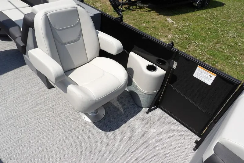 Slide: The Image of Luxurious seating on 2026 Sylvan R-22 LZ DH pontoon boat with cup holders and modern design. - 13