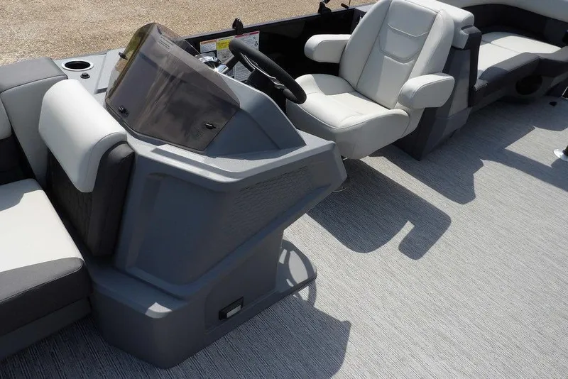 Slide: The Image of Interior of 2026 Sylvan R-22 LZ DH boat with modern seating and steering console. - 14