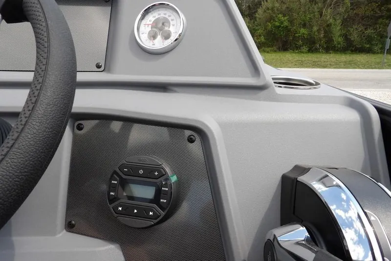 Slide: The Image of Dashboard of 2026 Sylvan R-22 LZ DH boat with steering wheel and controls. - 19