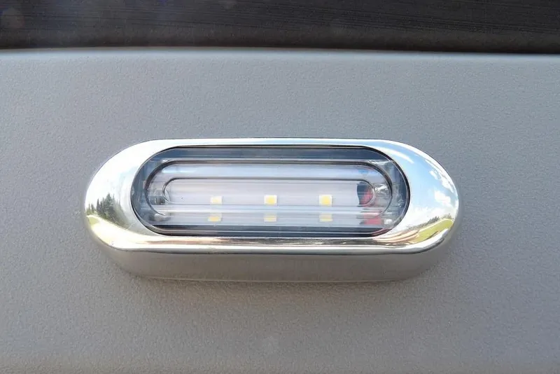 Slide: The Image of LED light on 2026 Sylvan R-22 LZ DH boat, chrome finish. - 24