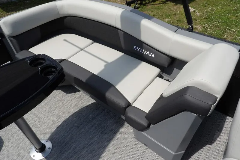 Slide: The Image of Luxurious seating on 2026 Sylvan R-22 LZ DH pontoon boat with cup holders. - 27