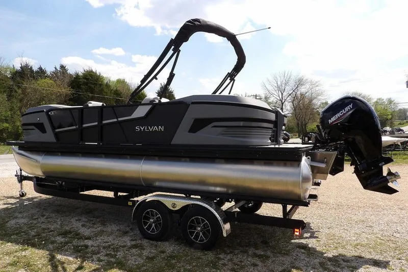Slide: The Image of 2026 Sylvan R-22 LZ DH pontoon boat on trailer with Mercury outboard motor. - 8