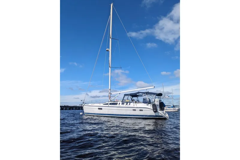 Slide: The Image of Sailboat on water, 2002 Hunter 410 model, under clear blue sky. - 37