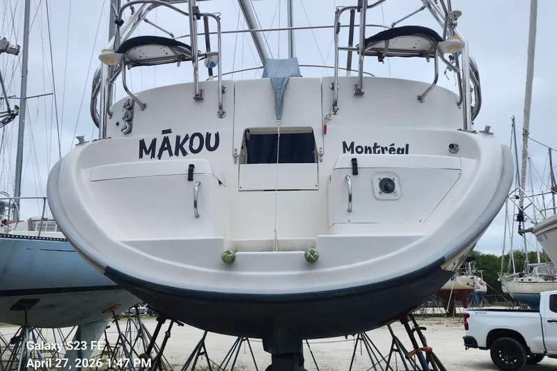Slide: The Image of Sailboat "Mākou" from Montréal, Hunter 410 model, 2002, docked in a marina. - 40