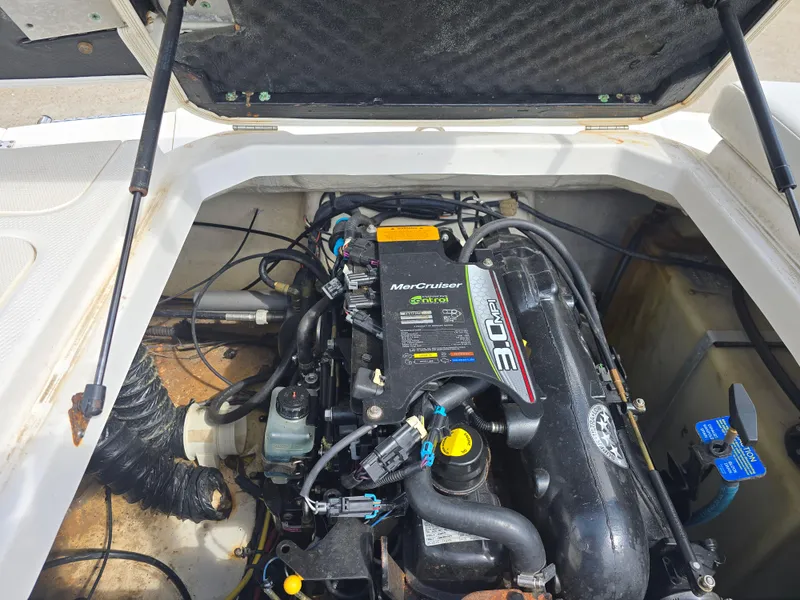 Slide: The Image of 2016 Chaparral 18 H2O Sport engine compartment with MerCruiser 3.0 MPI motor. - 10