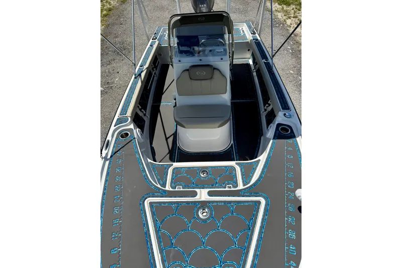 Slide: The Image of 2023 Key West 188 Bay Reef boat interior with detailed deck design. - 10