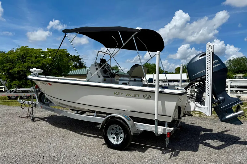 Slide: The Image of 2023 Key West 188 Bay Reef boat on trailer with Yamaha outboard motor. - 31