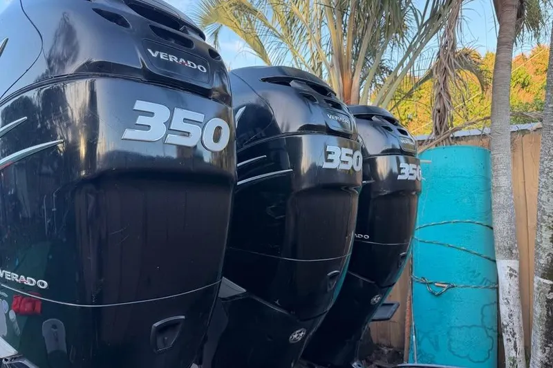 Slide: The Image of 2007 Wellcraft 35 Scarab Sport Open boat on trailer, close-up of outboard motor. - 3