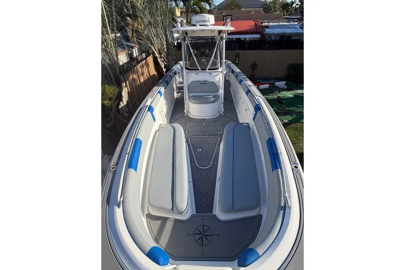 Slide: The Image of Rear view of 2007 Wellcraft 35 Scarab Sport Open boat with triple outboard engines. - 7