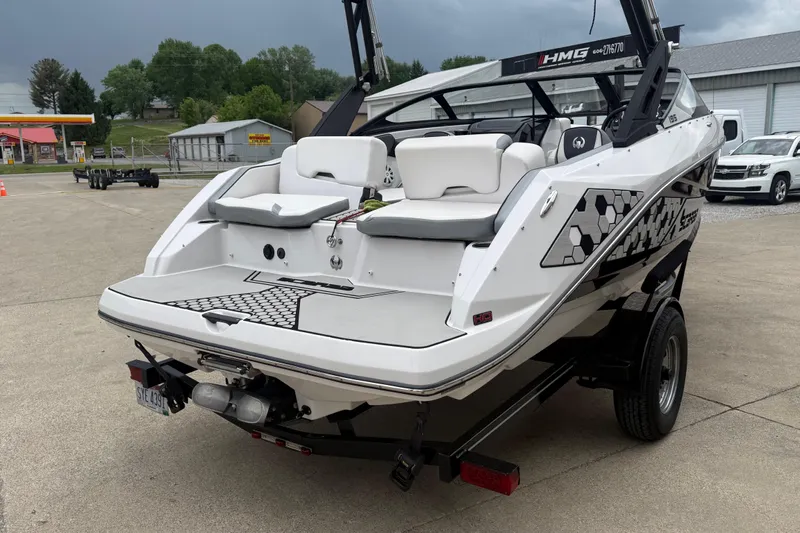 Slide: The Image of 2017 Scarab 195 H.O. boat on trailer, featuring sleek design and modern graphics. - 4