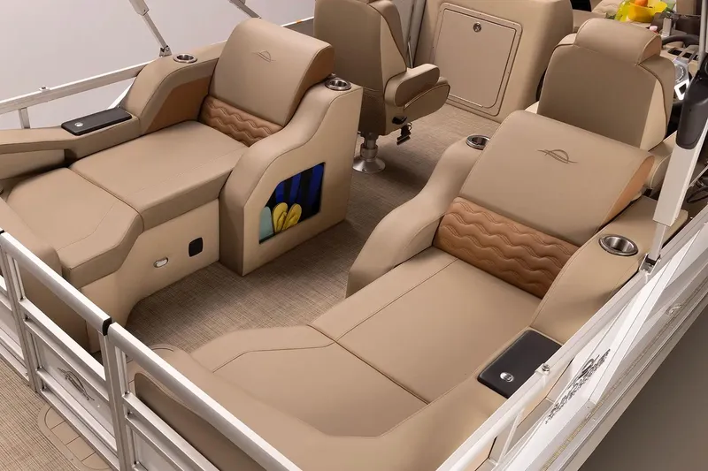 Slide: The Image of Luxurious interior of 2026 SunCatcher Elite 322SR pontoon boat with plush seating and cup holders. - 15