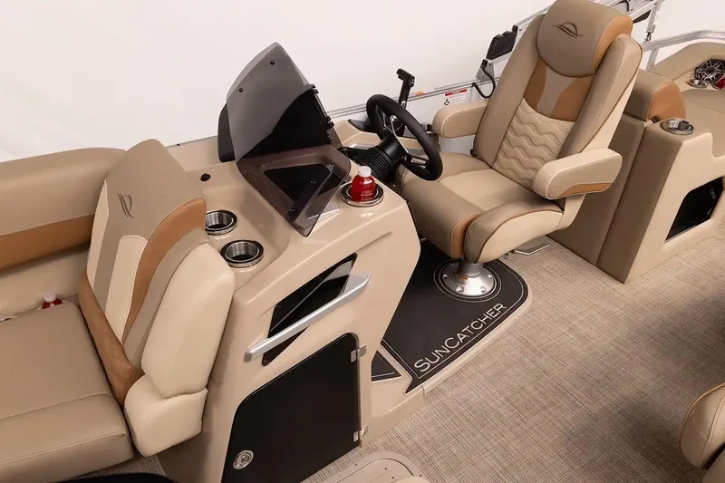 Slide: The Image of Luxurious interior of 2026 SunCatcher Elite 322SR boat with plush seating and modern helm. - 5