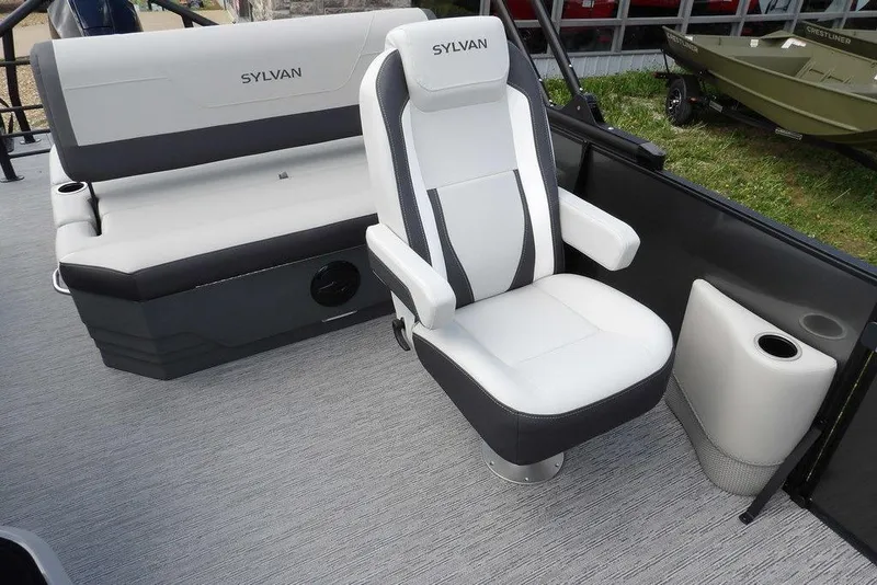 Slide: The Image of 2026 Sylvan X3 CLZ DH boat interior with white and gray seating. - 17