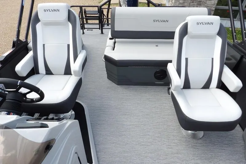 Slide: The Image of 2026 Sylvan X3 CLZ DH boat interior with modern white and gray seating. - 21
