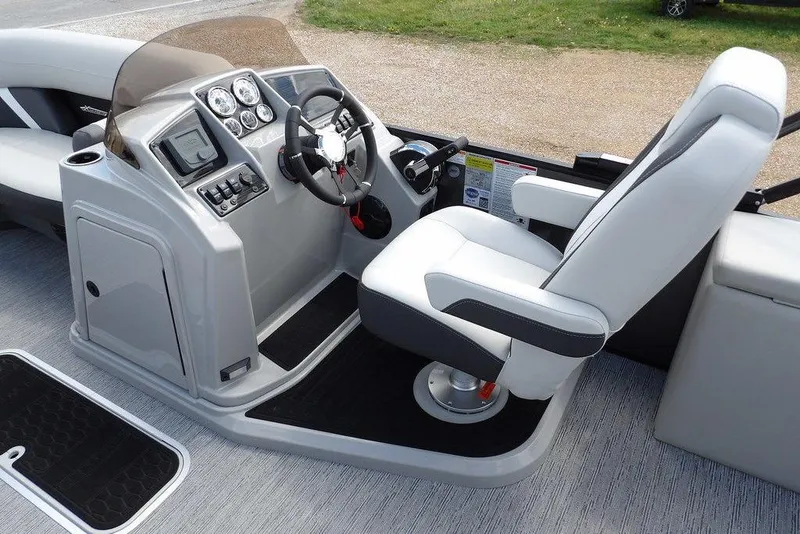 Slide: The Image of Modern helm of 2026 Sylvan X3 CLZ DH boat with sleek controls and comfortable seating. - 23