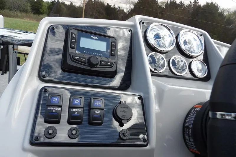 Slide: The Image of Dashboard of 2026 Sylvan X3 CLZ DH boat with controls and gauges. - 25