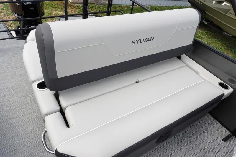 Slide: The Image of 2026 Sylvan X3 CLZ DH boat seat with cup holders, featuring sleek gray upholstery. - 27