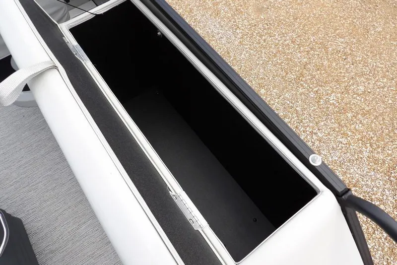 Slide: The Image of Open storage compartment in 2026 Sylvan X3 CLZ DH boat, featuring sleek design and ample space. - 29