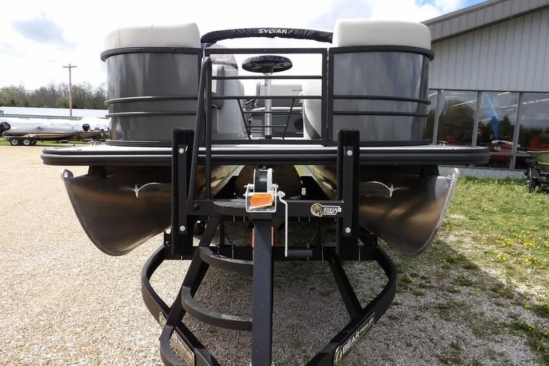 Slide: The Image of 2026 Sylvan X3 CLZ DH pontoon boat on trailer, outdoor display. - 3