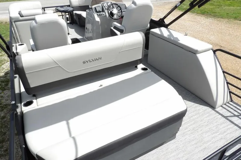 Slide: The Image of 2026 Sylvan X3 CLZ DH boat interior with seating and steering console. - 34