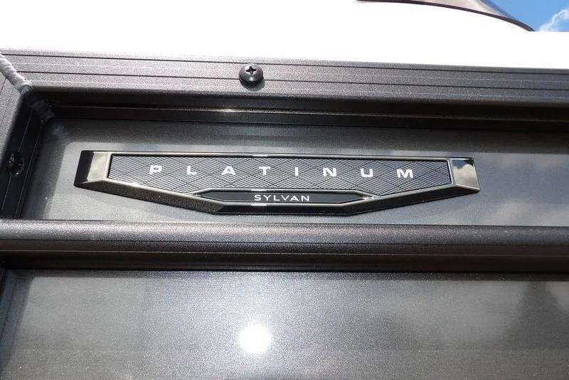 Slide: The Image of Close-up of 2026 Sylvan X3 CLZ DH Platinum emblem on a sleek surface. - 46