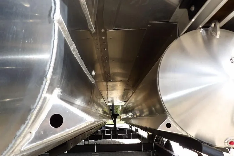 Slide: The Image of Underneath view of 2026 Sylvan X3 CLZ DH pontoon boat, showcasing aluminum structure. - 48