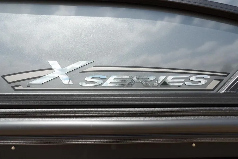 Slide: The Image of 2026 Sylvan X3 CLZ DH X Series logo on sleek metallic surface. - 49