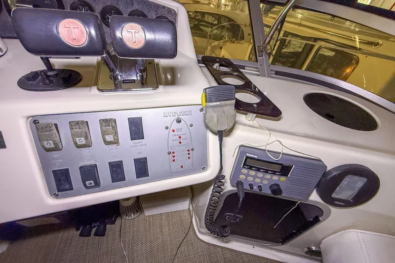 Slide: The Image of Control panel of a 1995 Sea Ray 370 Sedan Bridge boat cockpit. - 32