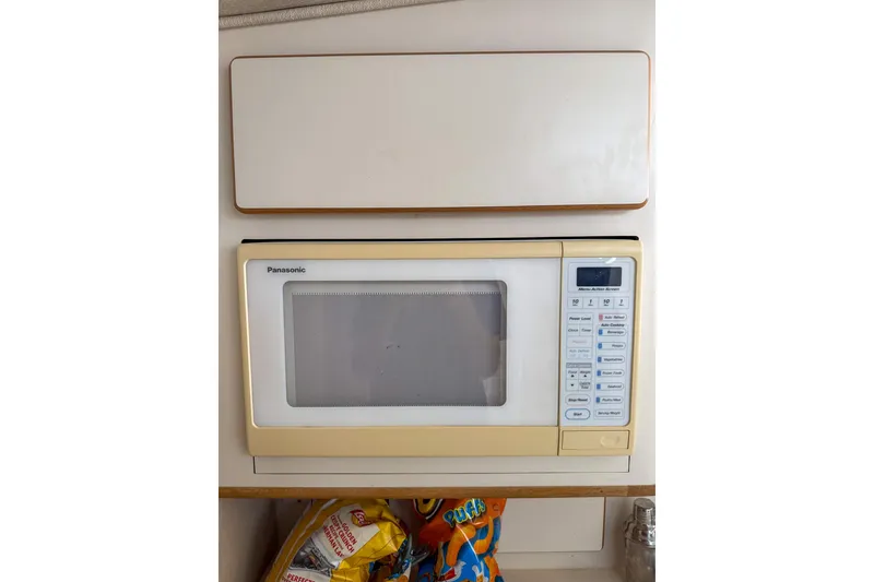 Slide: The Image of Panasonic microwave in 1995 Sea Ray 370 Sedan Bridge yacht kitchen. - 18
