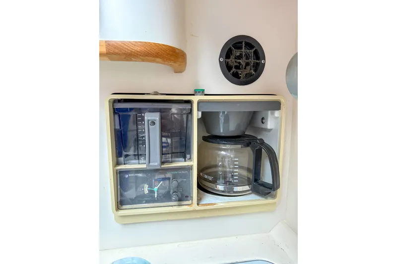 Slide: The Image of Built-in coffee maker on a 1995 Sea Ray 370 Sedan Bridge yacht kitchen. - 19