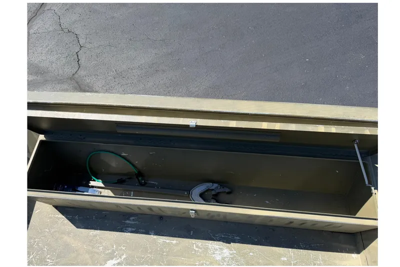 Slide: The Image of Open storage compartment of 2008 Tracker Grizzly 1648 T Blind Duck Edition boat. - 9